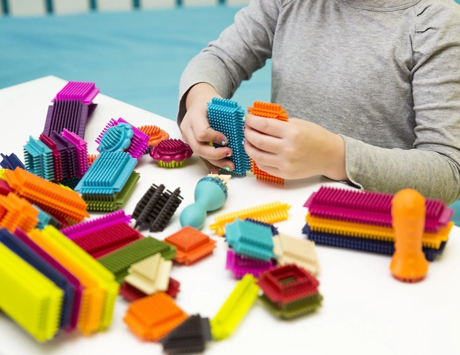 B. toys- Bristle Block - Stackadoos- Sort & Stack STEM Building Blocks Set – 68 Interlocking Blocks- toys For Toddlers, Kids - Storage Jar With Lid – 2 Years  